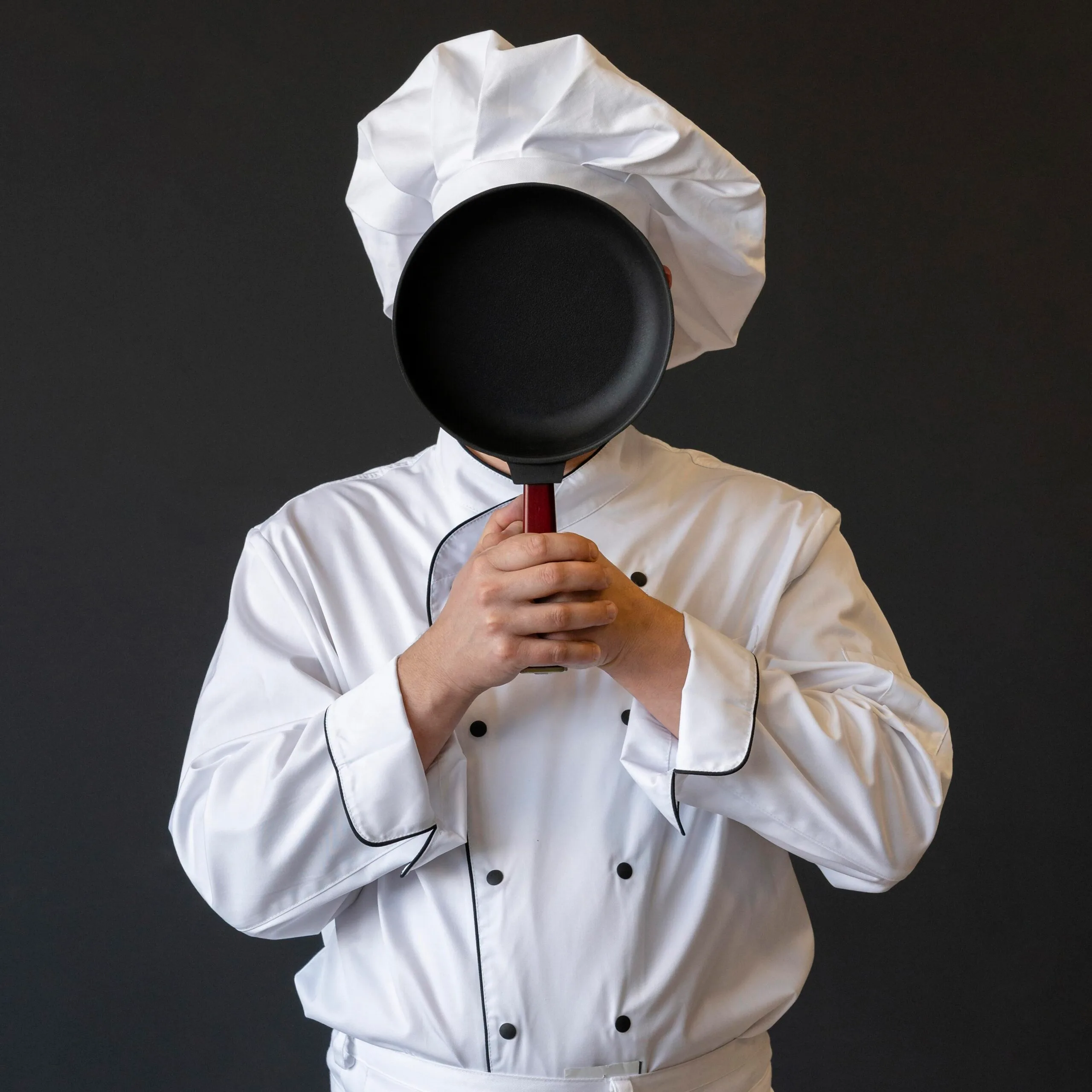 chef-covering-face-with-pan chef-covering-face-with-pan